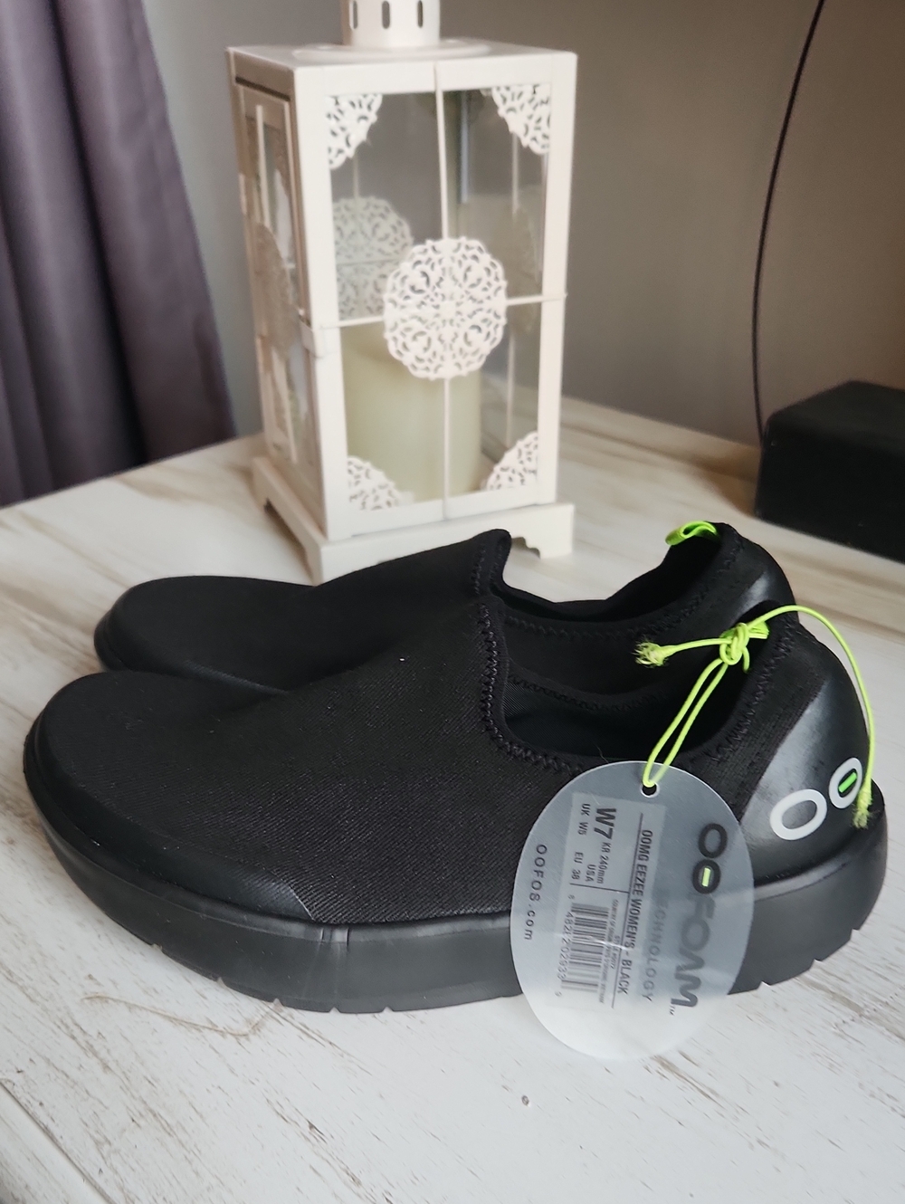 OOFOS Women’s Black Slip-On Sneakers with Neon Green Accents